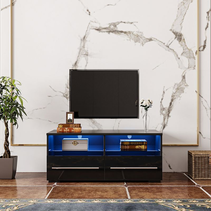 FC Design The black TV cabinet has two drawers with color-changing light strips