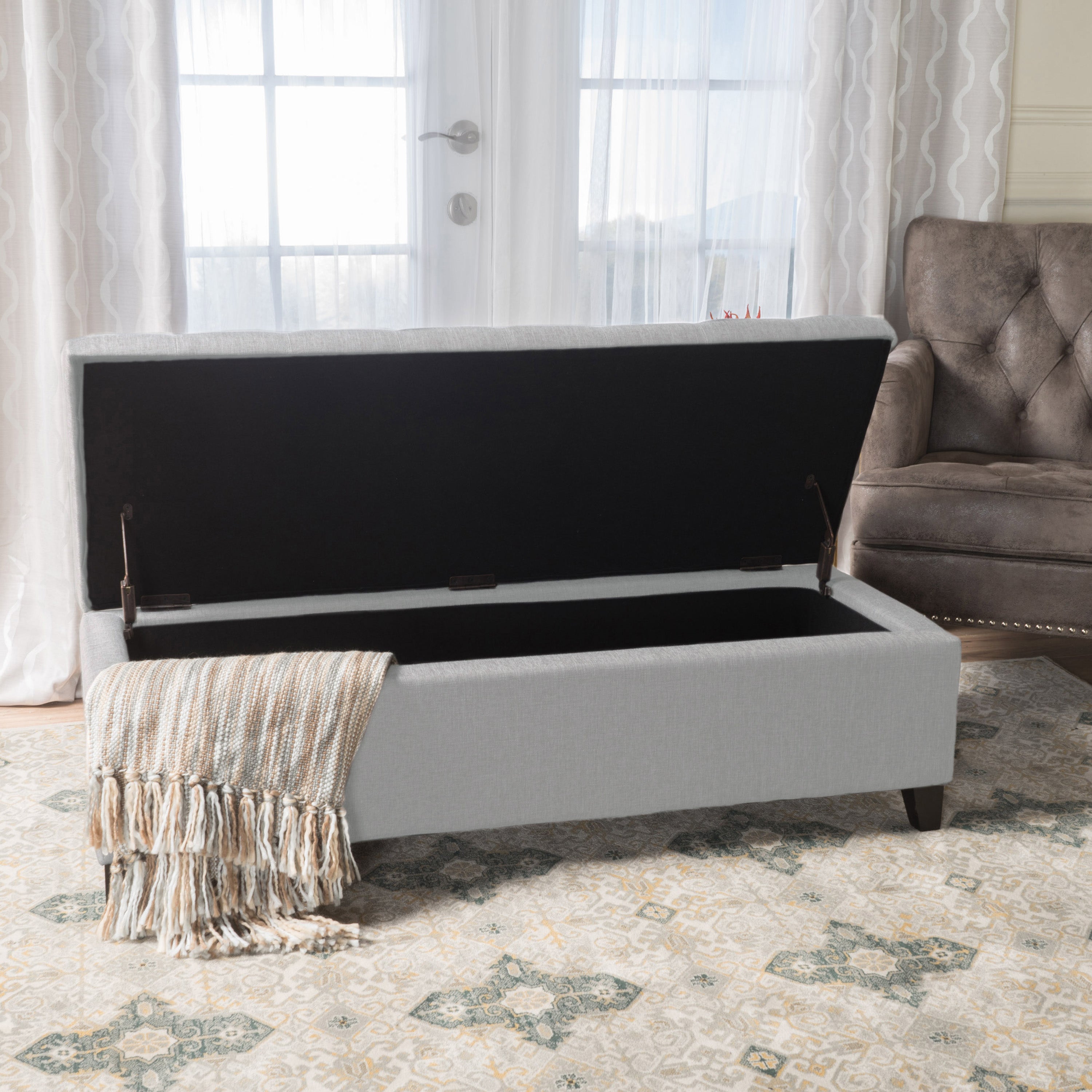 Sterling Fabric Tufted Storage Ottoman