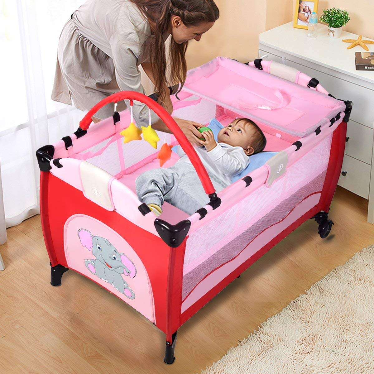 BABY JOY 3 in 1 Pack and Play, Portable Playard with Hanging Toys, 2 Lockable Wheels Diaper Changing Table