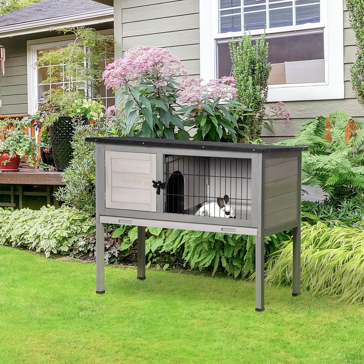 PawHut Hinged Asphalt Roof Elevated Rabbit Hutch