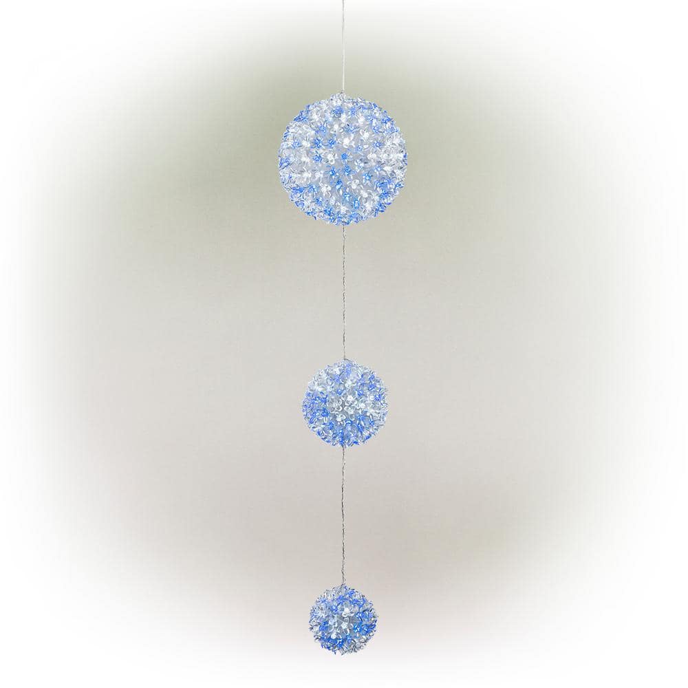 Alpine Corporation 37 in. Tall 3-Tier Christmas Ornaments With Chasing Blue and White LED Lights COR164