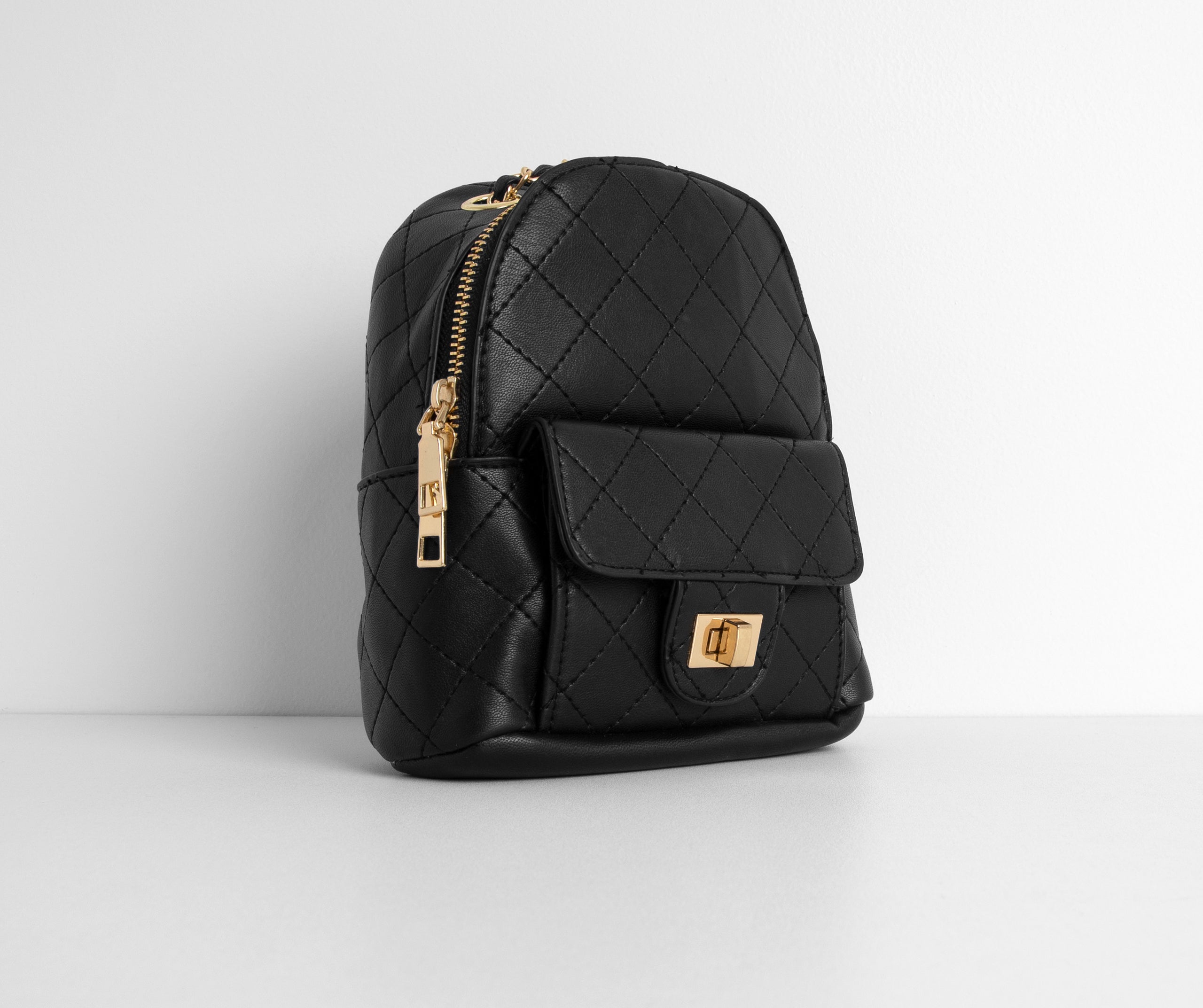 Day To Night Quilted Chain Backpack