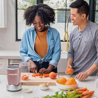 NutriBullet Pro 32 oz. Single Speed Rose Gold Blender with 24 oz. Cup and Lids NB9-0901RG