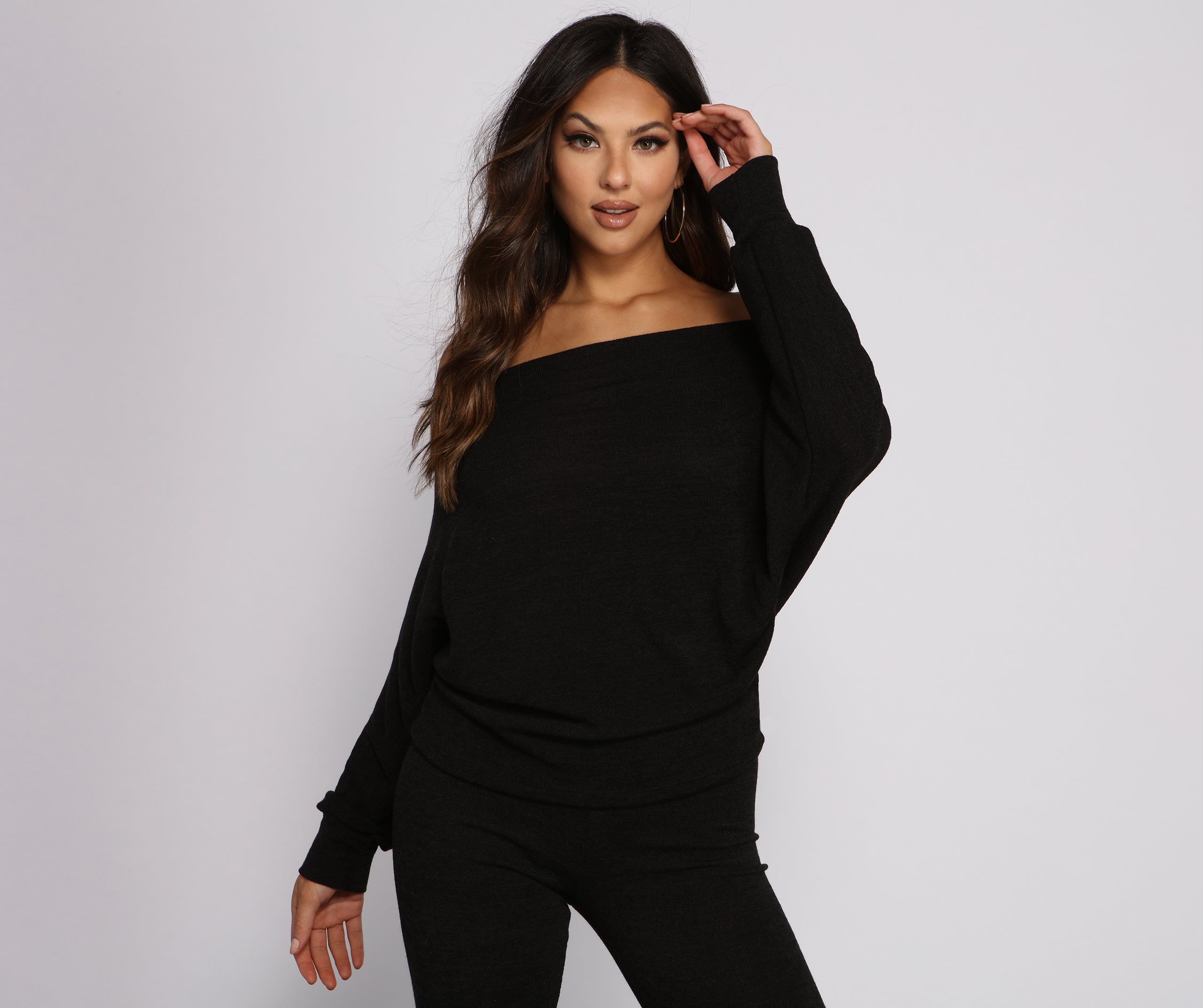 Strike A Pose Dolman Sleeve Knit Top