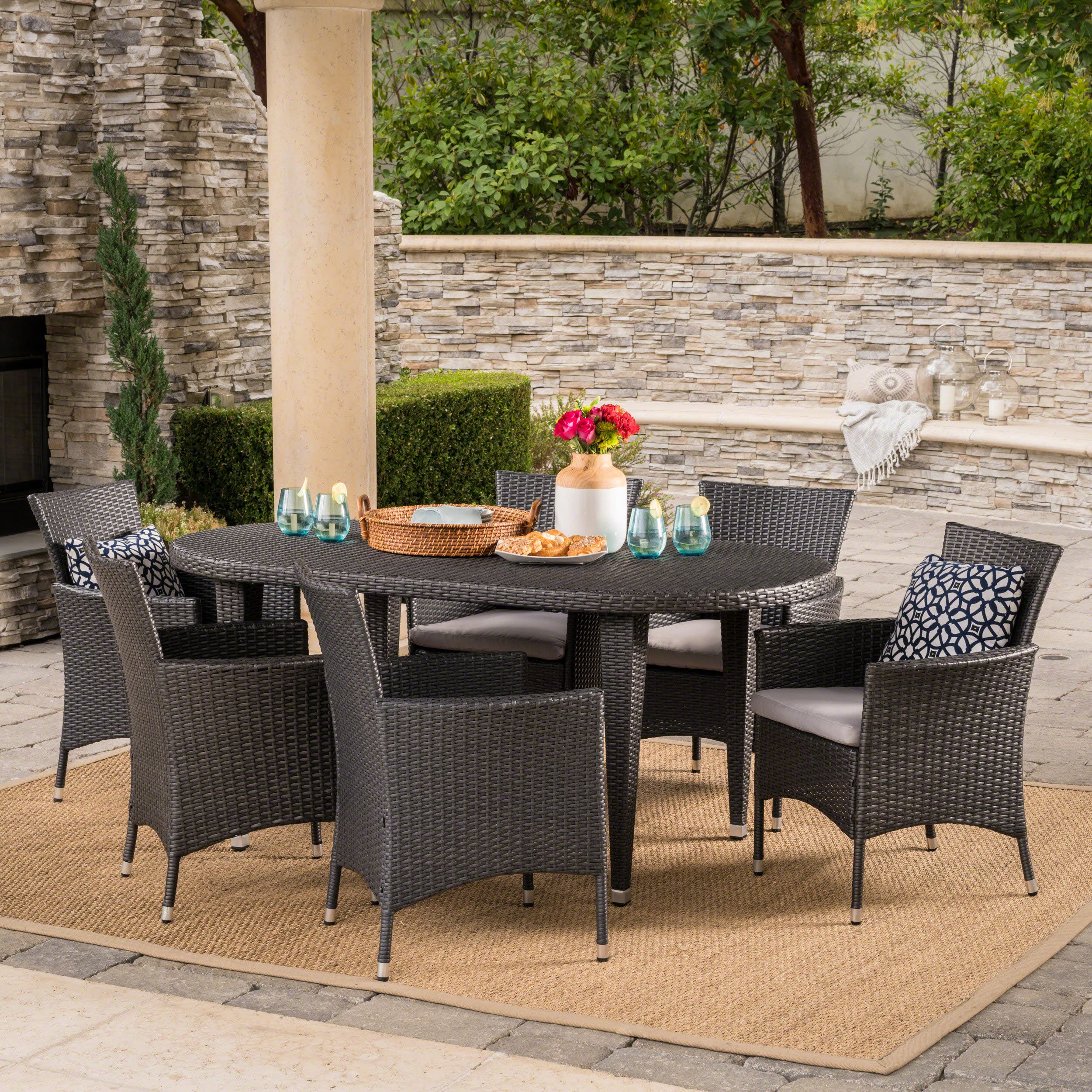 Vineland Outdoor 7 Piece Gray Wicker Oval Dining Set with Silver Water Resistant Cushions