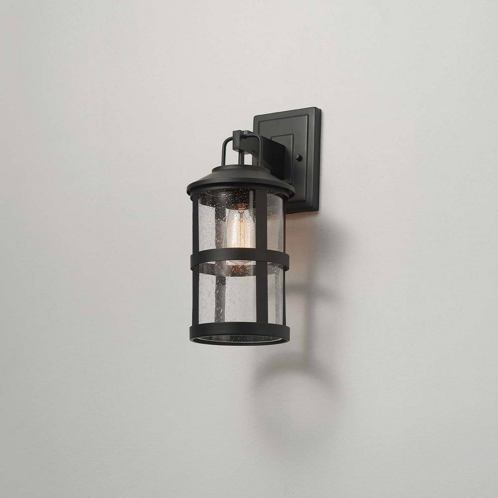 Globe Electric Penelope Matte Black Modern IndoorOutdoor 1-Light Wall Sconce with Seeded Glass Shade 44732