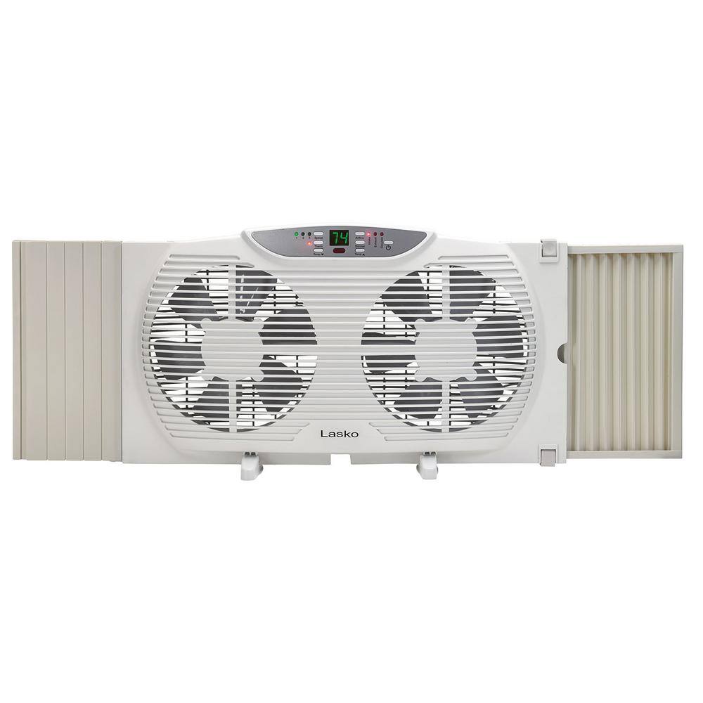 Lasko 9 in. Remote Control Electronically Reversible Twin Window Fan with Thermostat W09550