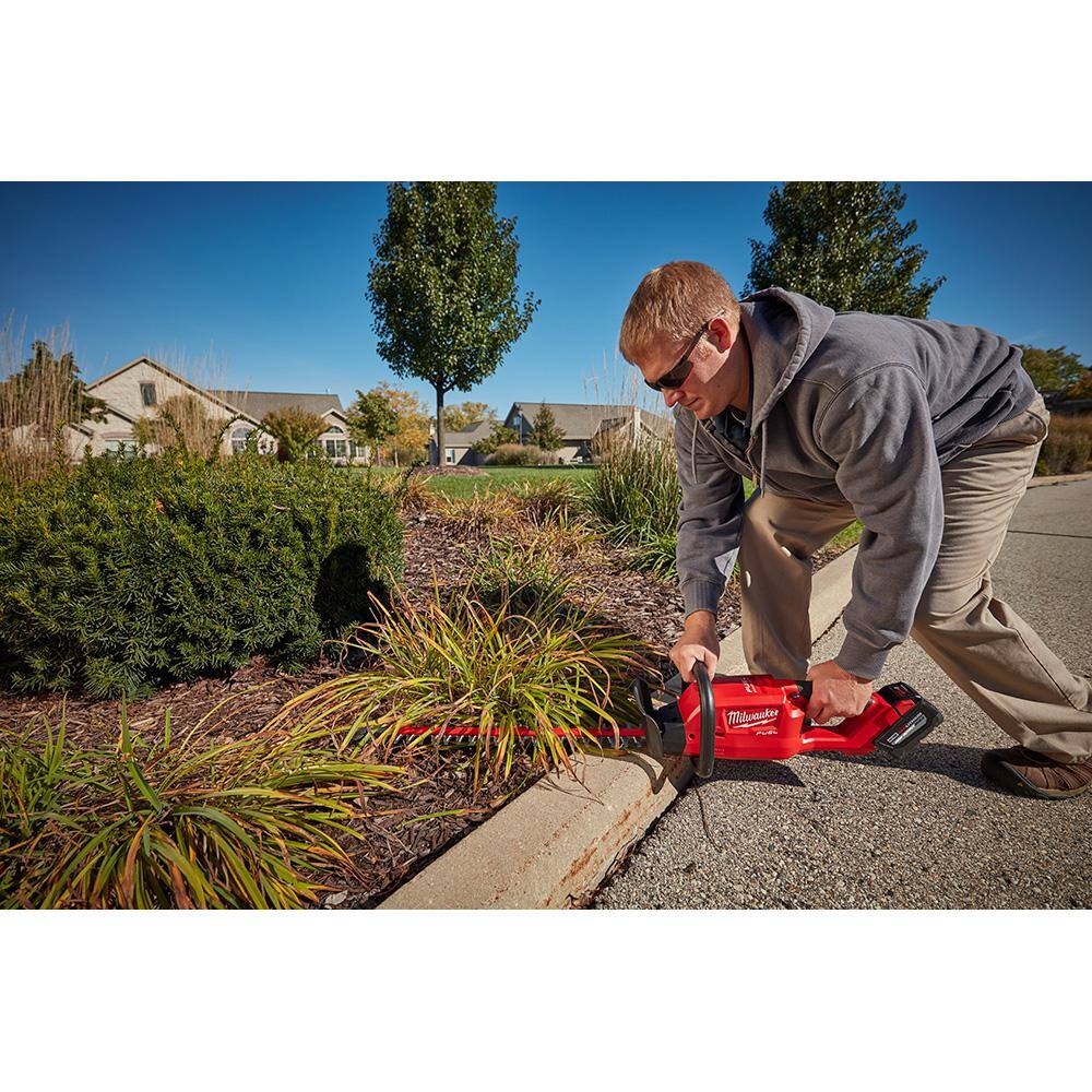 MW M18 FUEL 10 in. 18V Lithium-Ion Brushless Electric Cordless Pole Saw Kit w M18 FUEL 24 in. Hedge Trimmer  8Ah Battery 2825-21PS-2726-20