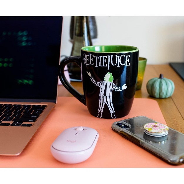 Curved Ceramic Mug Holds 25 Ounces