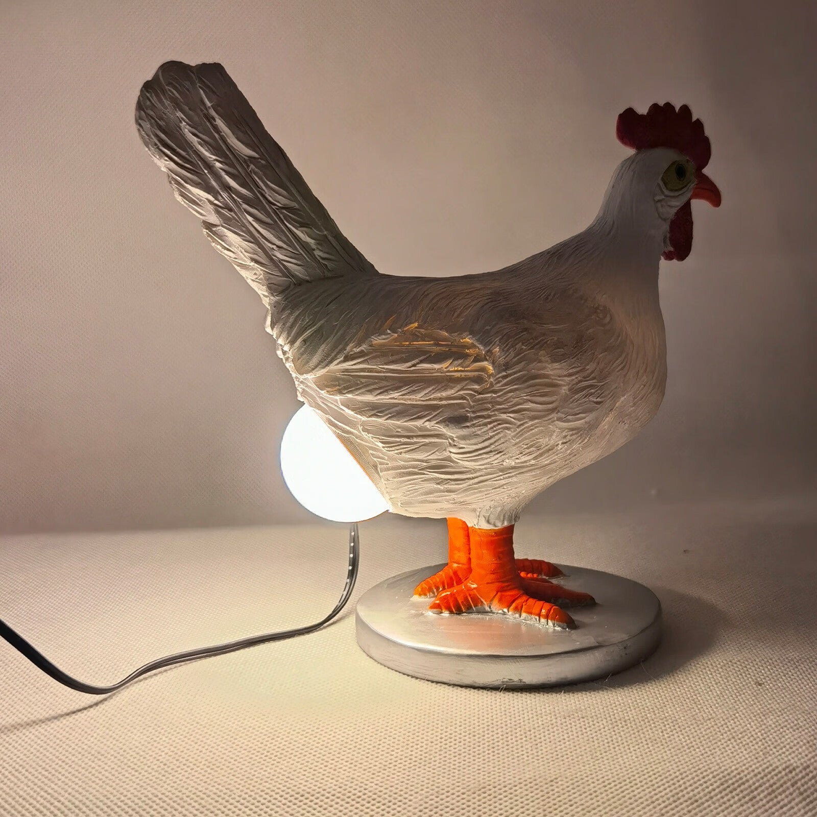 This Taxidermy Chicken Eggs Lamp Exists and We Begrudgingly Love It