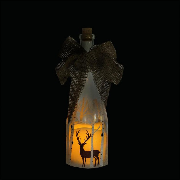 Led Flameless Pillar Candle In A Clear Glass Bottle Lantern With Deer Accents