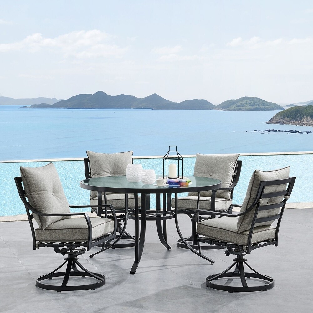 Hanover Lavallette 5 Piece Dining Set in Silver Linings with 4 Swivel Rockers and a 52 In. Round Glass Top Table