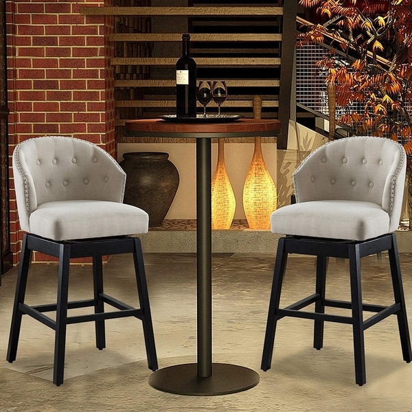 Copper Grove Arichuna Solid Wood Swiveling Tan Tufted Bar Stools (Set of 2)