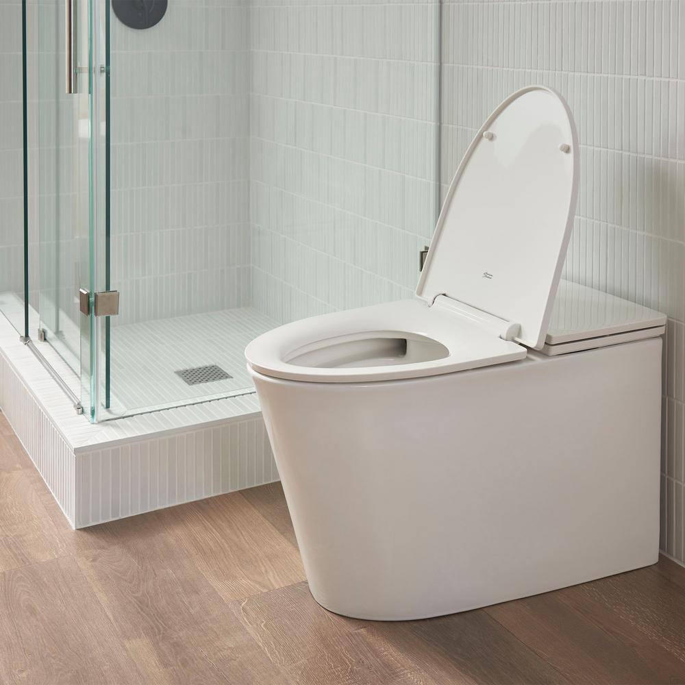 American Standard Studio S 1-piece 1.0 GPF Single Flush Elongated Low-Profile Toilet in White Seat Included 2548A100.020