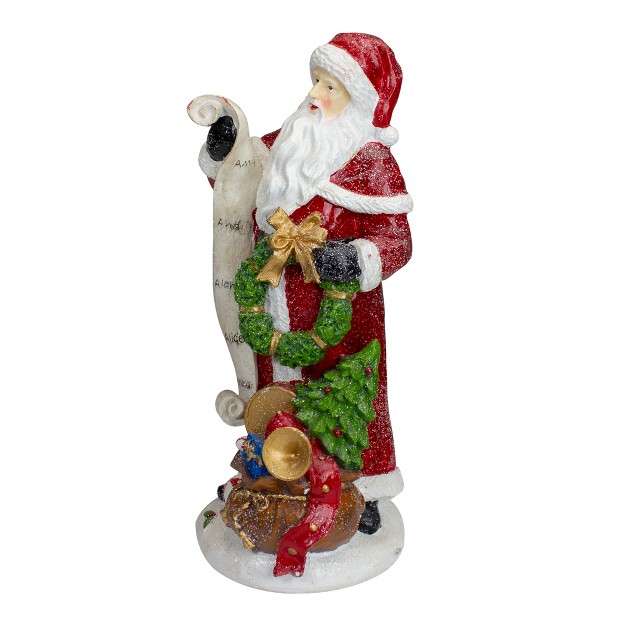 Santa Claus With Nice And Naughty List Christmas Tabletop Figurine