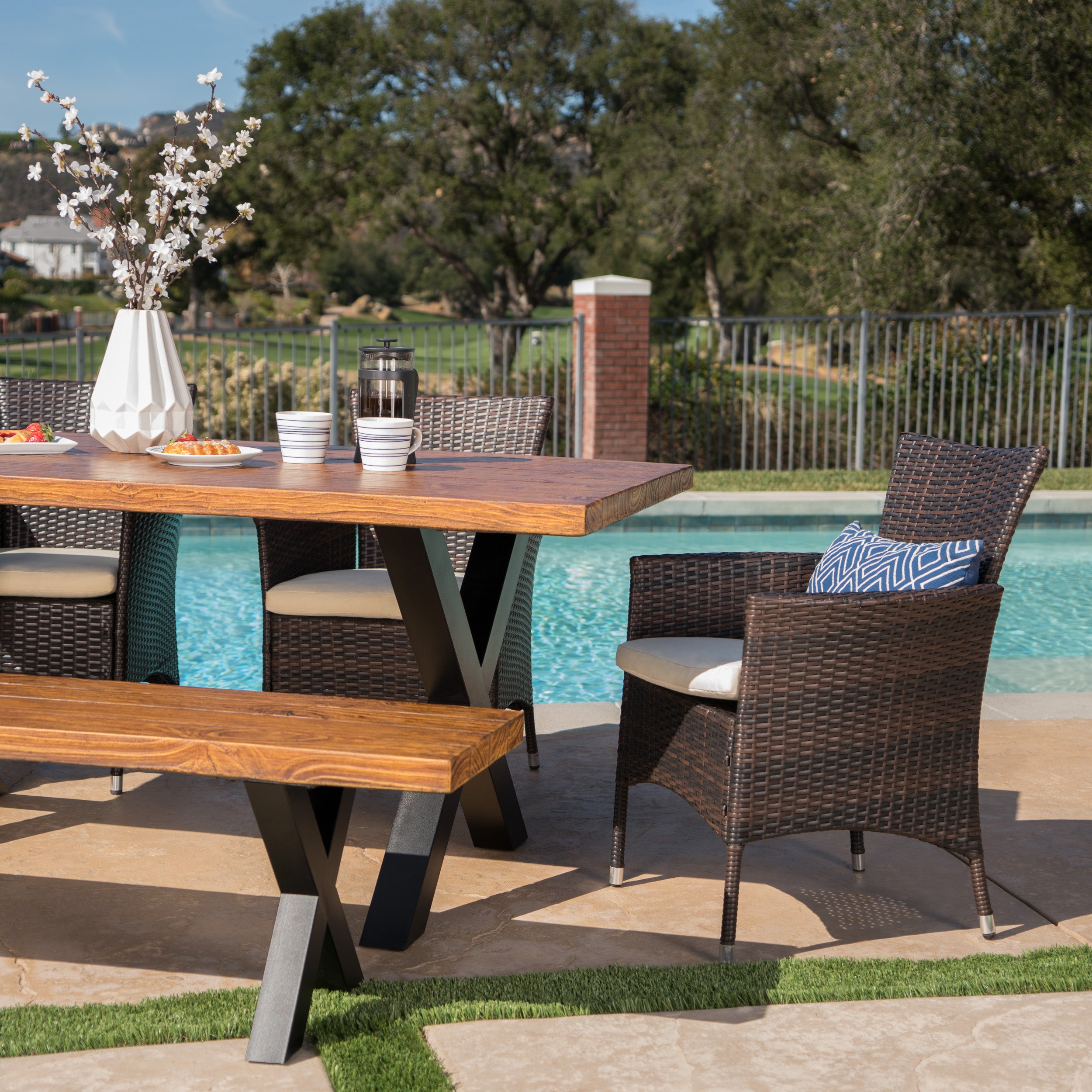 Nazareno Outdoor 6 Piece Wicker Dining Set with Concrete Table and Bench