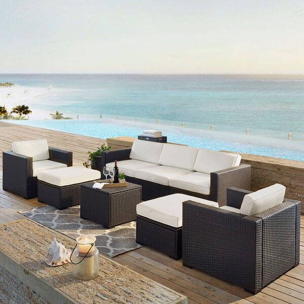 Biscayne 7 Person Outdoor Wicker Seating Set in White - One Loveseat， Two Arm Chairs， One Corner Chair， One Coffee Table， Two Ottomans