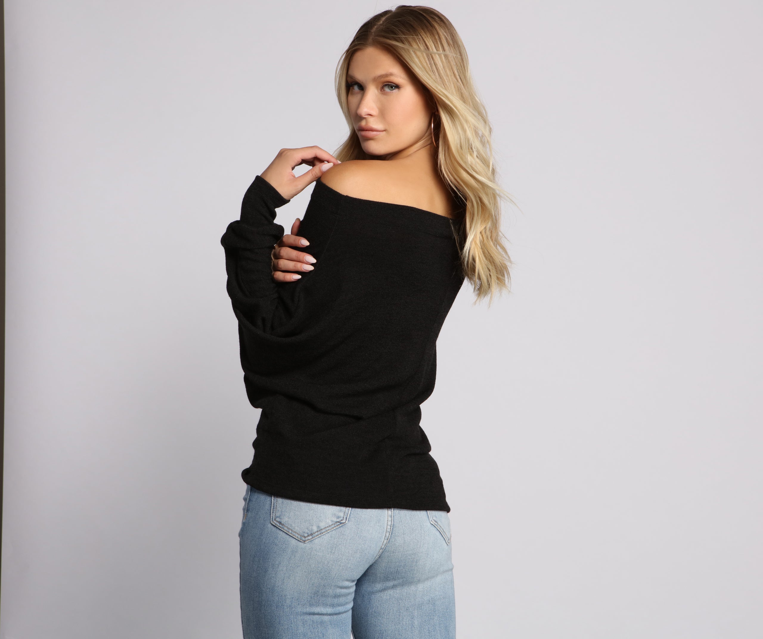 Strike A Pose Dolman Sleeve Knit Top