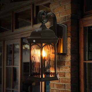 Home Decorators Collection Bronze Integrated LED Outdoor Wall Lantern Sconce with Flickering BulbClear Glass with Motion Sensor and Photocell FL-381HD