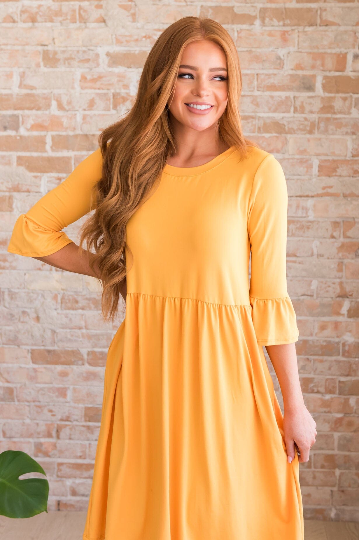 Zadie vibrant orange bell-sleeve gown