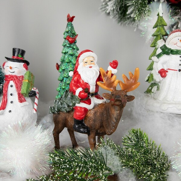 Santa Claus on a Reindeer Holding a Frosted Pine Tree Christmas Figurine