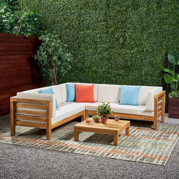 Oana Outdoor 5 Seater V Shaped MidCentury Modern Acacia Wood Sectional Sofa Set with Coffee Table by Christopher Knight Home