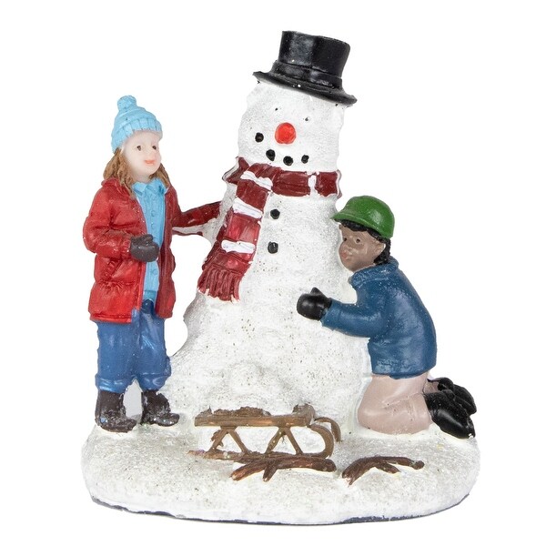 Children Build a Snowman Christmas Village Display Piece