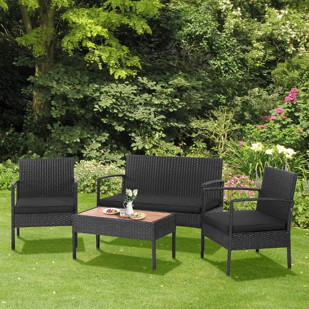 Costway 4pcs Patio Rattan Furniture Set Cushioned Chair Wooden Tabletop Black