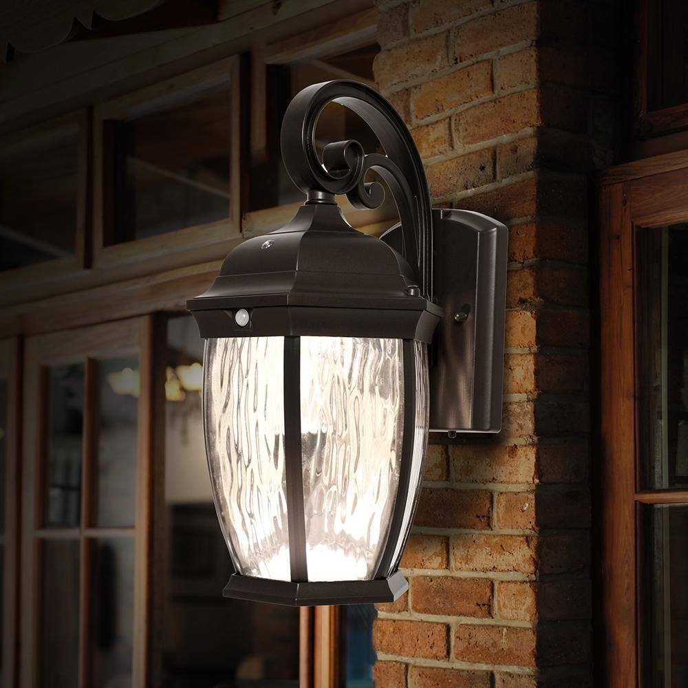 Home Decorators Collection Bronze Integrated LED Outdoor Wall Lantern Sconce with Flickering BulbClear Glass with Motion Sensor and Photocell FL-380HD