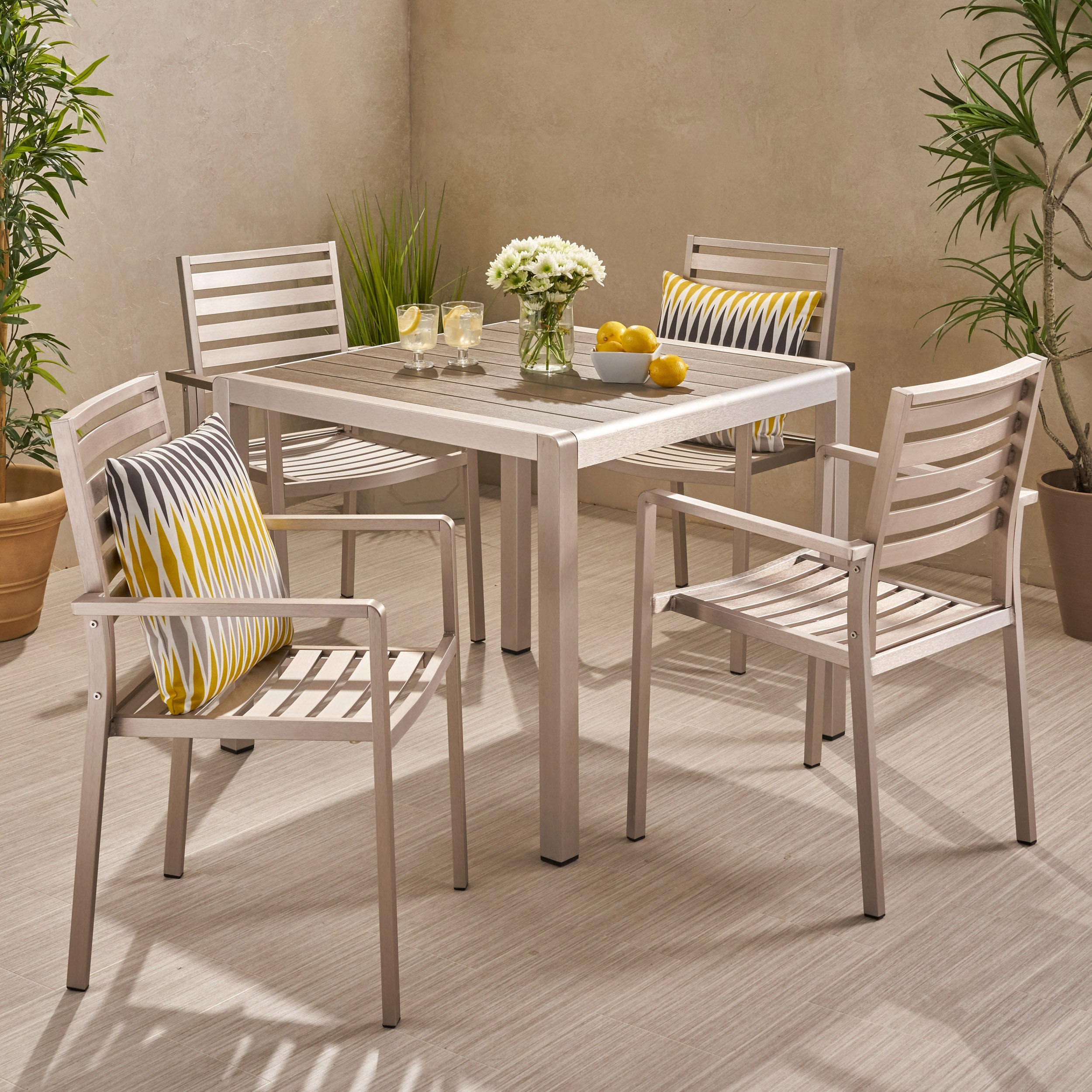 Cherie Outdoor Modern 4 Seater Aluminum Dining Set with Faux Wood Table Top