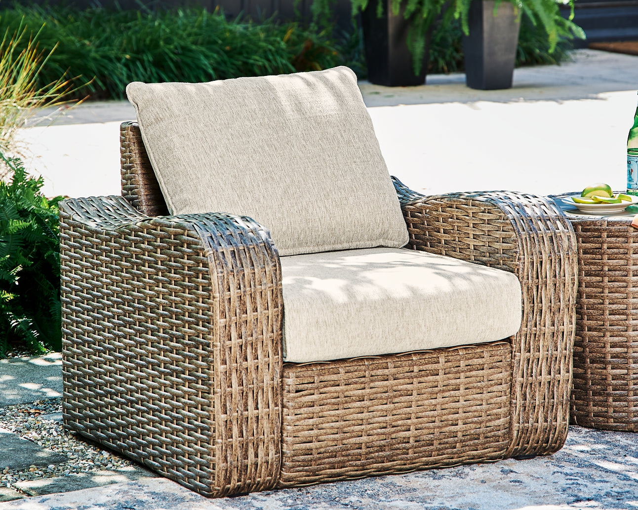 Sandy Bloom Outdoor Lounge Chair and Ottoman