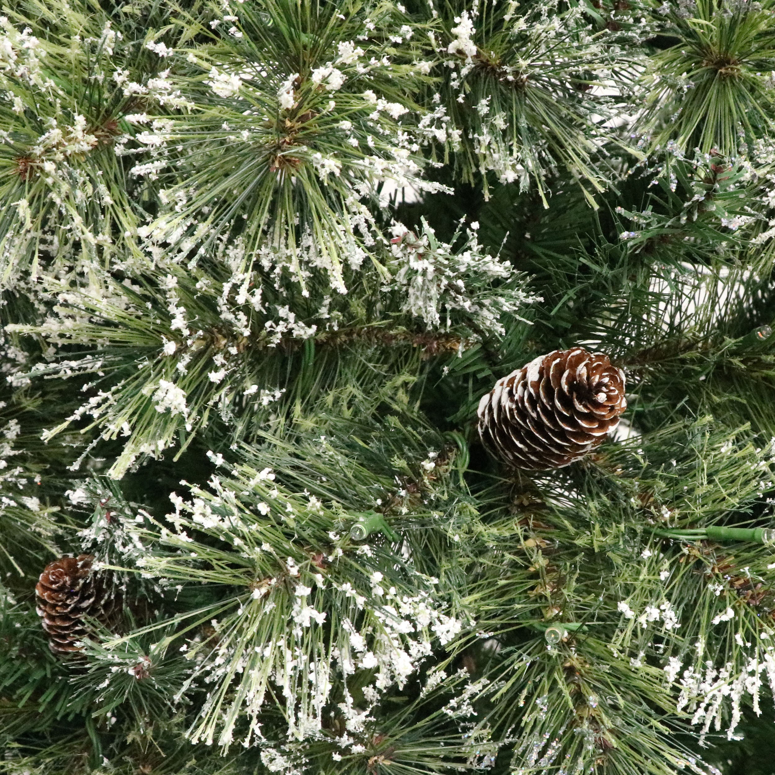 7-foot Cashmere Pine and Mixed Needles Pre-Lit Clear LED Hinged Artificial Christmas Tree with Snow and Glitter Branches and Frosted Pinecones