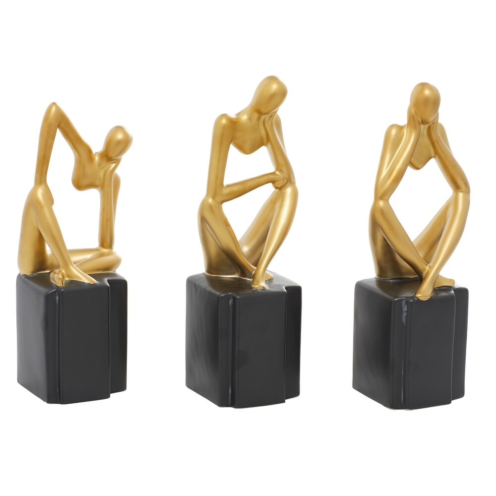 CosmoLiving by Cosmopolitan Silver or Gold Porcelain Sitting Thinker People Sculpture (Set of 3)