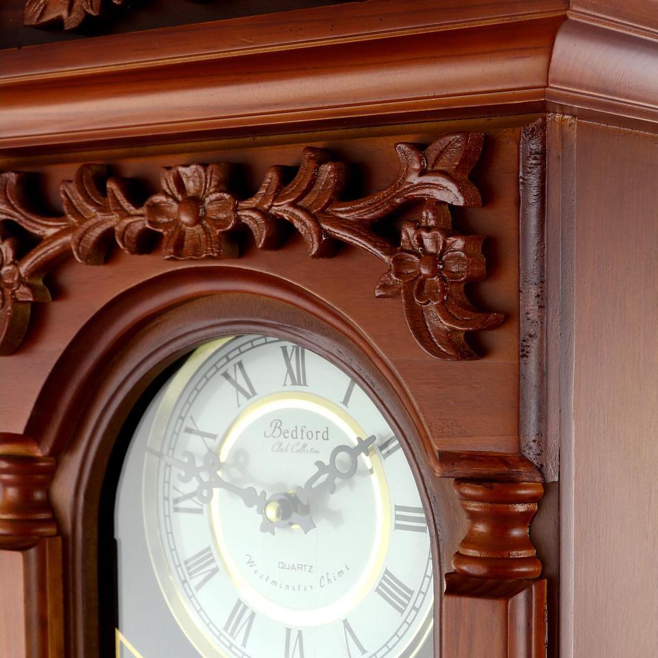 Bedford Clock Collection 27.5 Antique Chiming Wall Clock with Roman Numerals in a Padauk Oak Finish