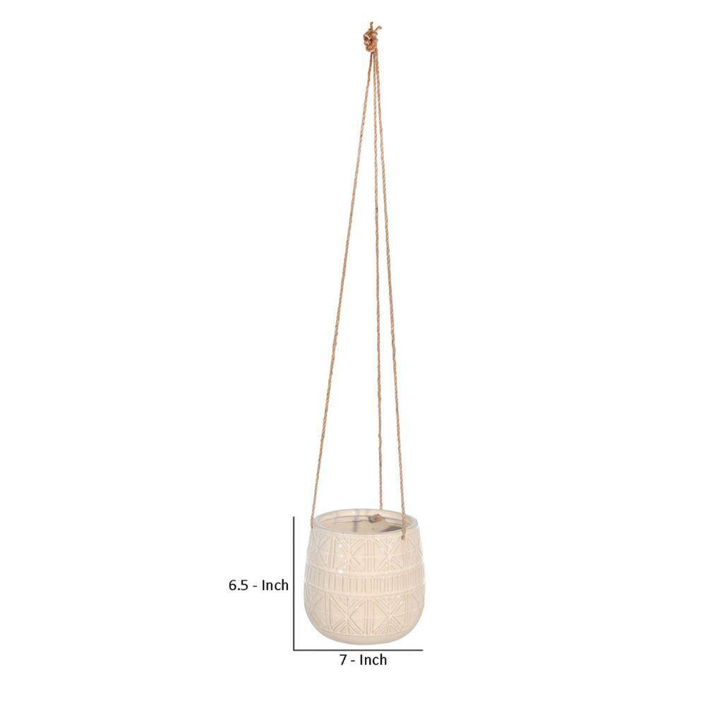 Benjara 7 in. L x 6.5 in. H Beige Hanging Planter with Ceramic Body and Abstract Details BM263811