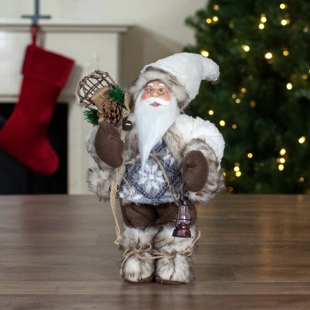 Snow Lodge Santa Christmas Figure With Lantern