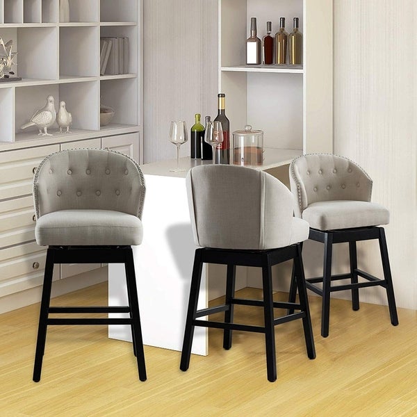 Copper Grove Arichuna Solid Wood Swiveling Tan Tufted Bar Stools (Set of 2)