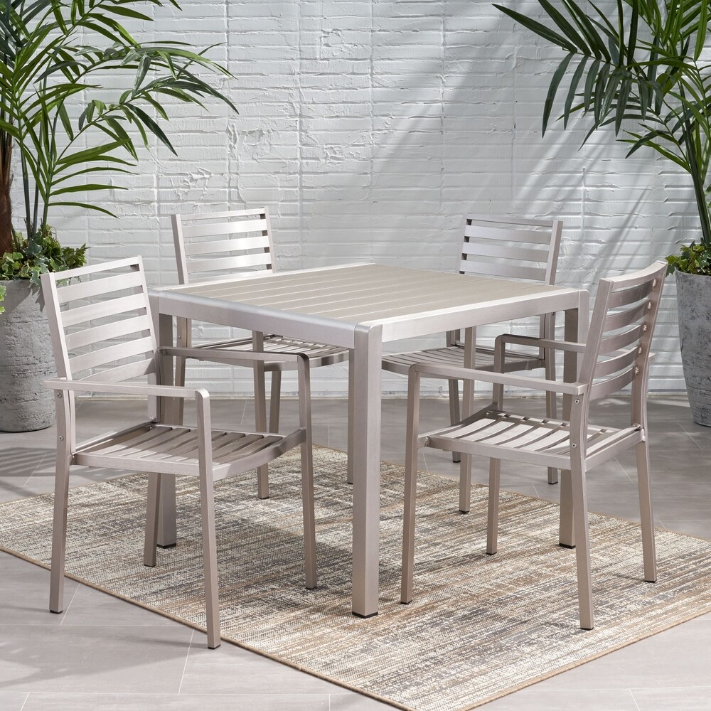 Cape Coral Outdoor Modern 4 Seater Aluminum Dining Set with Faux Wood Table Top by Christopher Knight Home