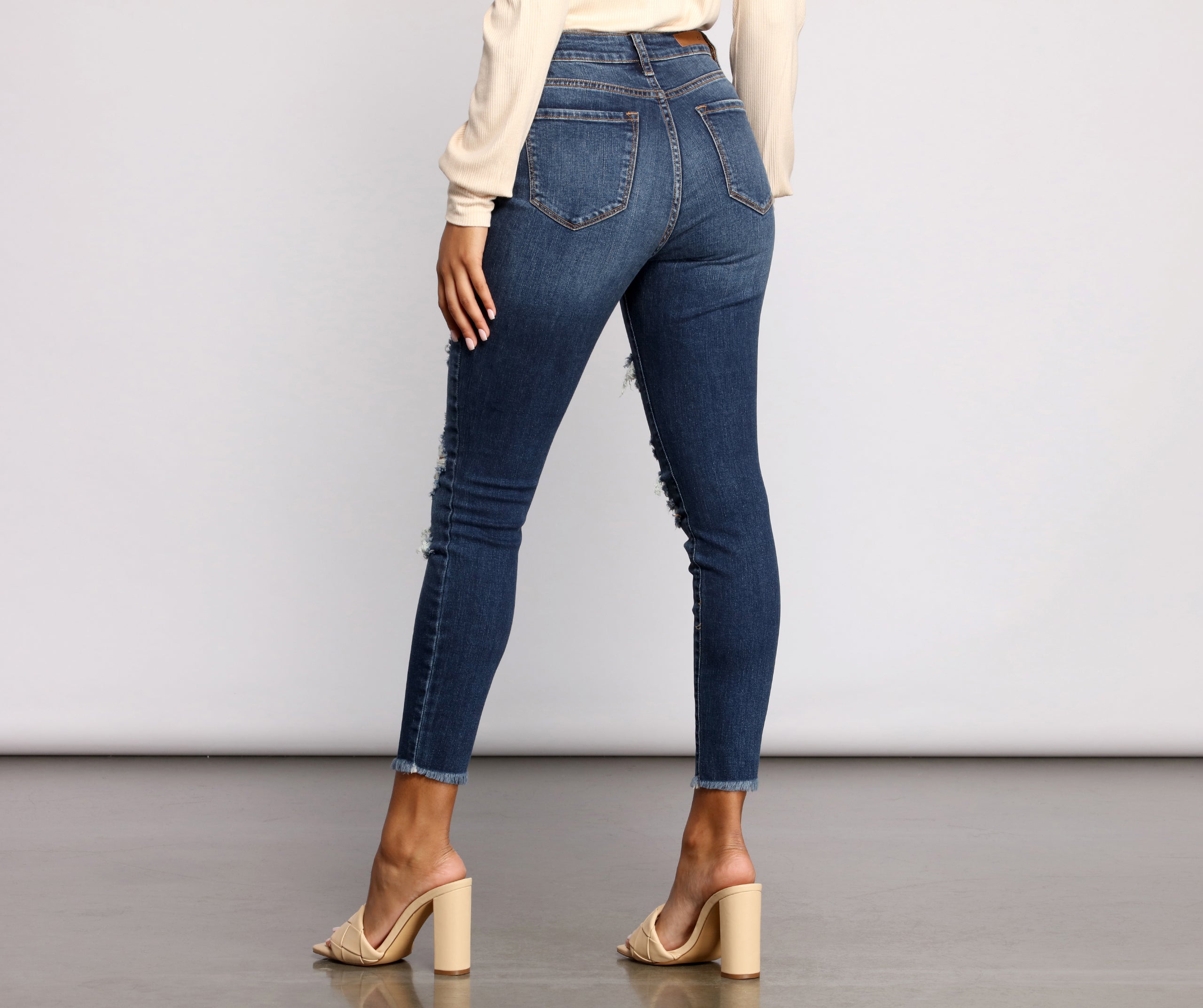 High Rise Destructed Skinny Jeans