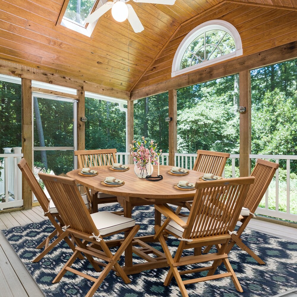 Chic Teak 7 Piece Teak Wood Miami Patio Dining Set with Round to Oval Extension Table  2 Arm Chairs and 4 Side Chairs