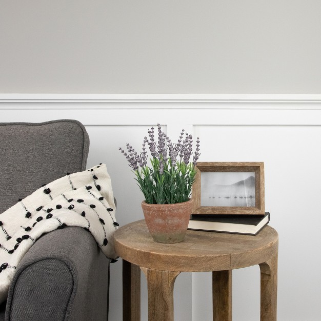 Artificial Lavender And Leaves In Weathered Pot