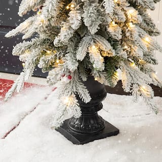 4 ft. Pre-Lit Flocked Fir Artificial Christmas Tree with 100 Warm White Lights and Red Berries