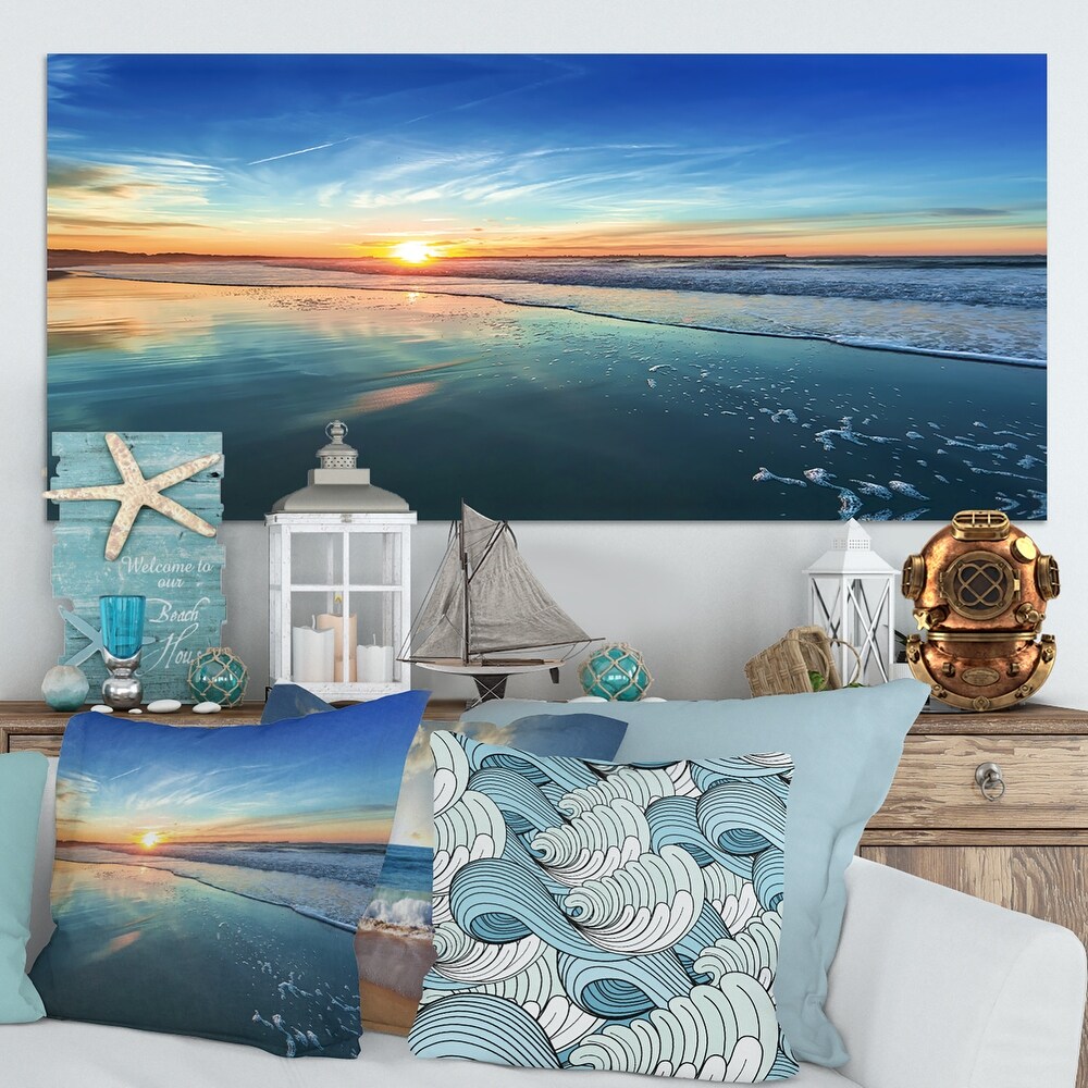 Blue Seashore with Distant Sunset   Seashore Canvas Wall Art