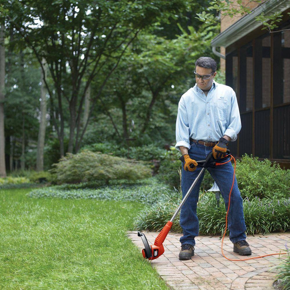 BLACK+DECKER 13 in. 4.0 Amp Corded Electric Straight Shaft Single Line 2-In-1 String Trimmer  Lawn Edger with Automatic Feed ST7700