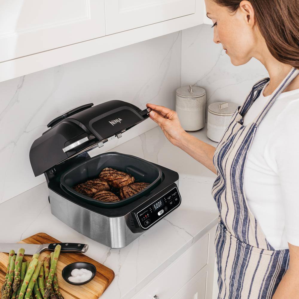 NINJA Foodi 5-in-1 Indoor Grill with 4 Qt. Air Fryer Roast Bake Dehydrate and Cyclonic Grilling (AG301) AG301