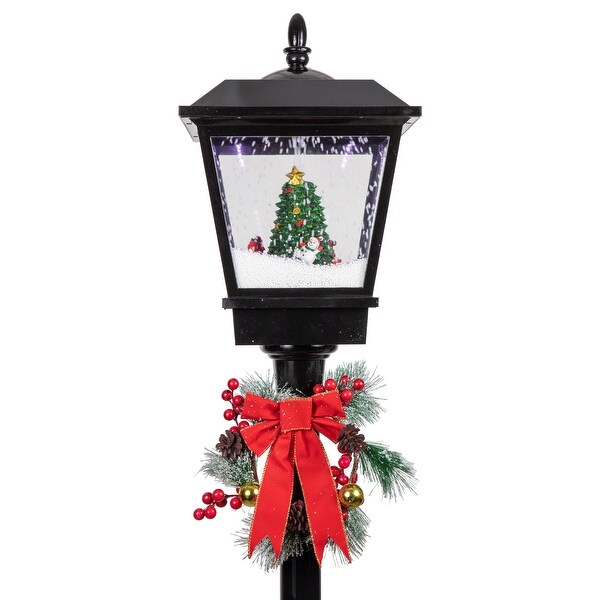 70.75 Lighted Musical Snowing Santa and Friends Christmas Street Lamp