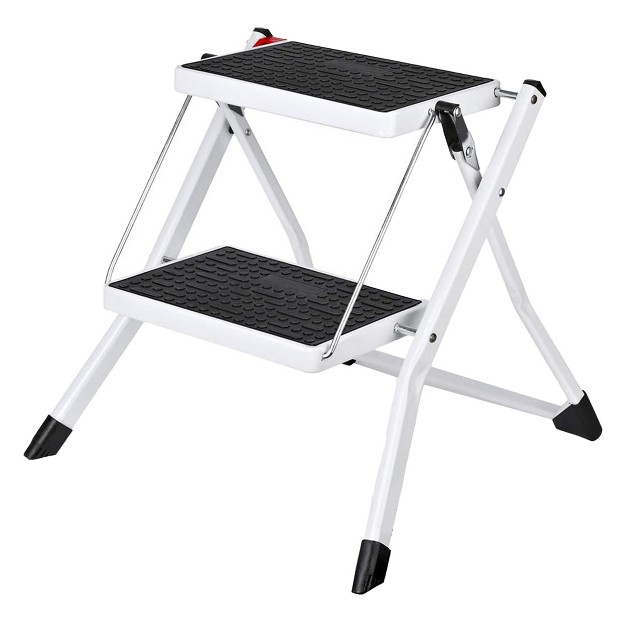 Delxo Portable Collapsible Lightweight Alloy Steel 2 Step Mini Stool Stepladder With Anti Slip Carry Hand Grip And Wide Pedal For Indoor Use White