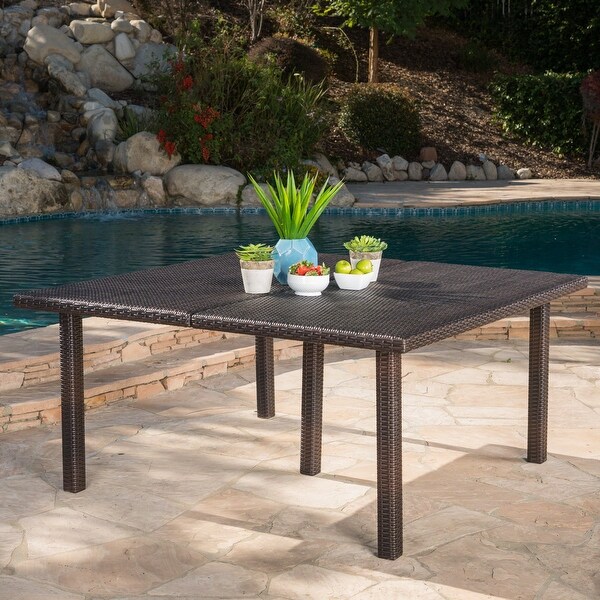 Outdoor 64 Inch Square Dining Table with Wicker Pulled Over an Iron Frame