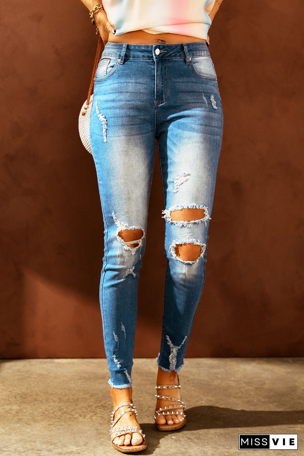 Faded Mid High Rise Jeans with Holes