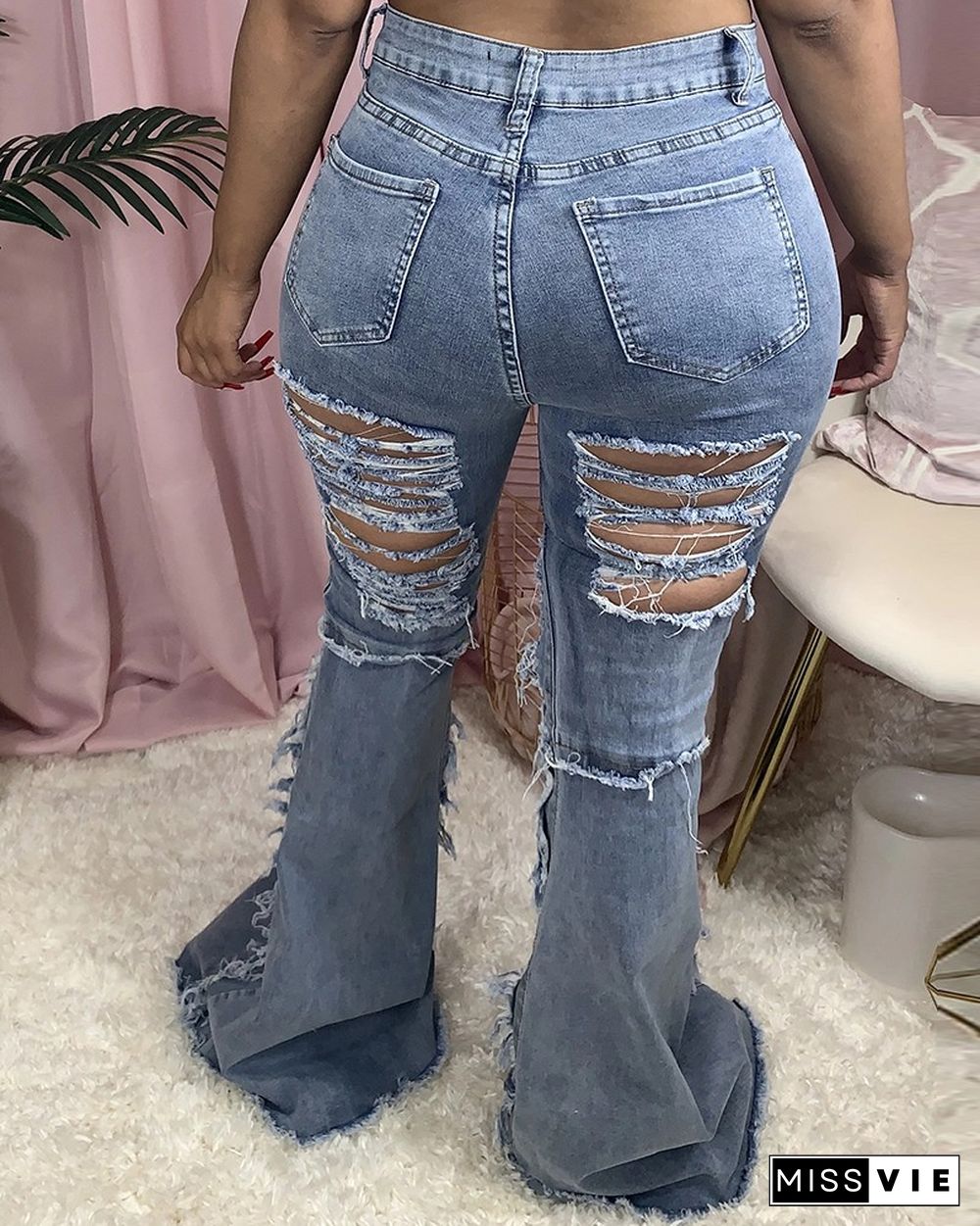 Ladder Cut Out Fringe Hem Bootcut Jeans